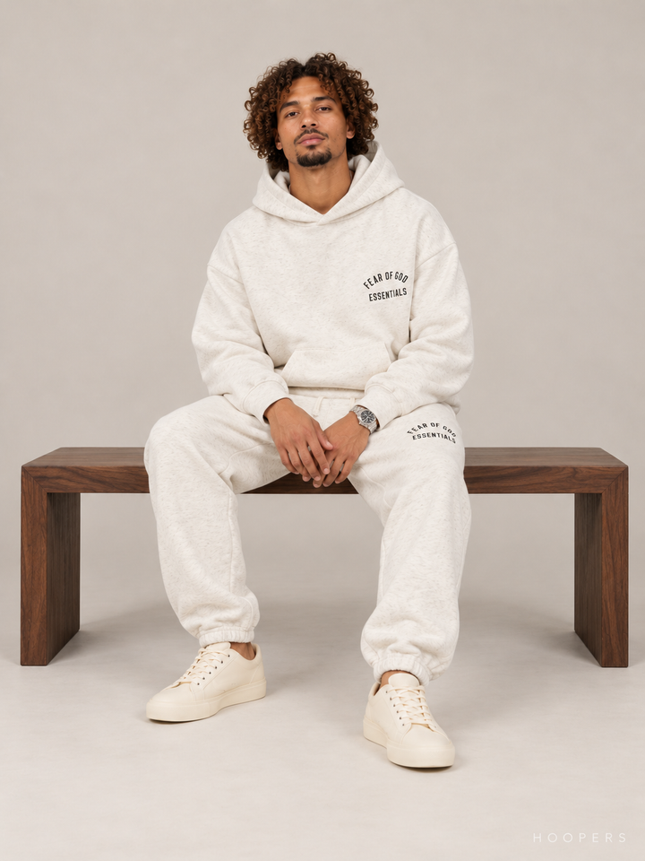 מכנס טרנינג Fear of God Essentials – Arch Jogger שמנת מלאנז' – סטודיו