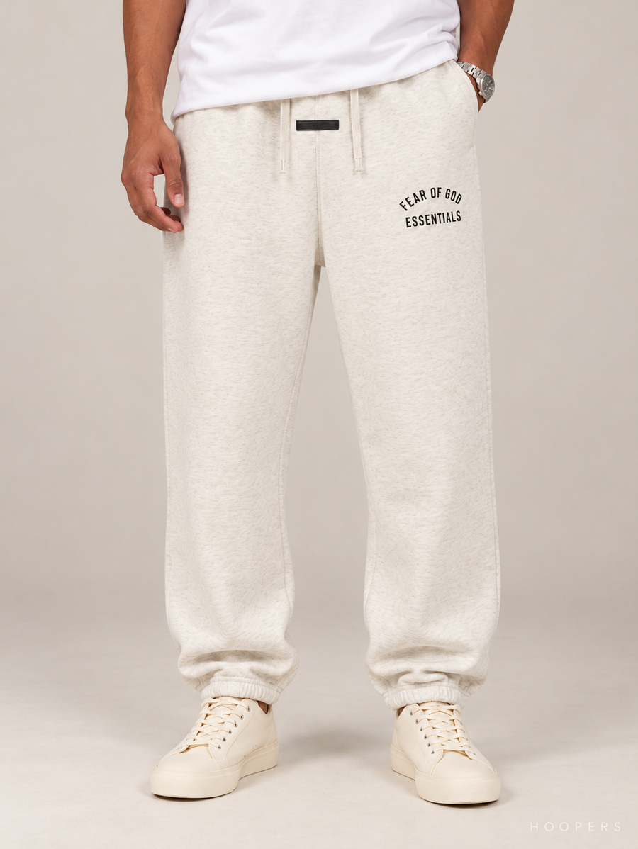 מכנס טרנינג Fear of God Essentials – Arch Jogger שמנת מלאנז' | HOOPERS