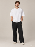 מכנס טרנינג Fear of God Essentials – Gold Script שחור | HOOPERS