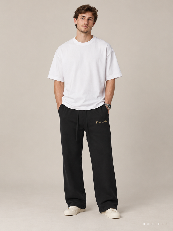 מכנס טרנינג Fear of God Essentials – Gold Script שחור – חזית