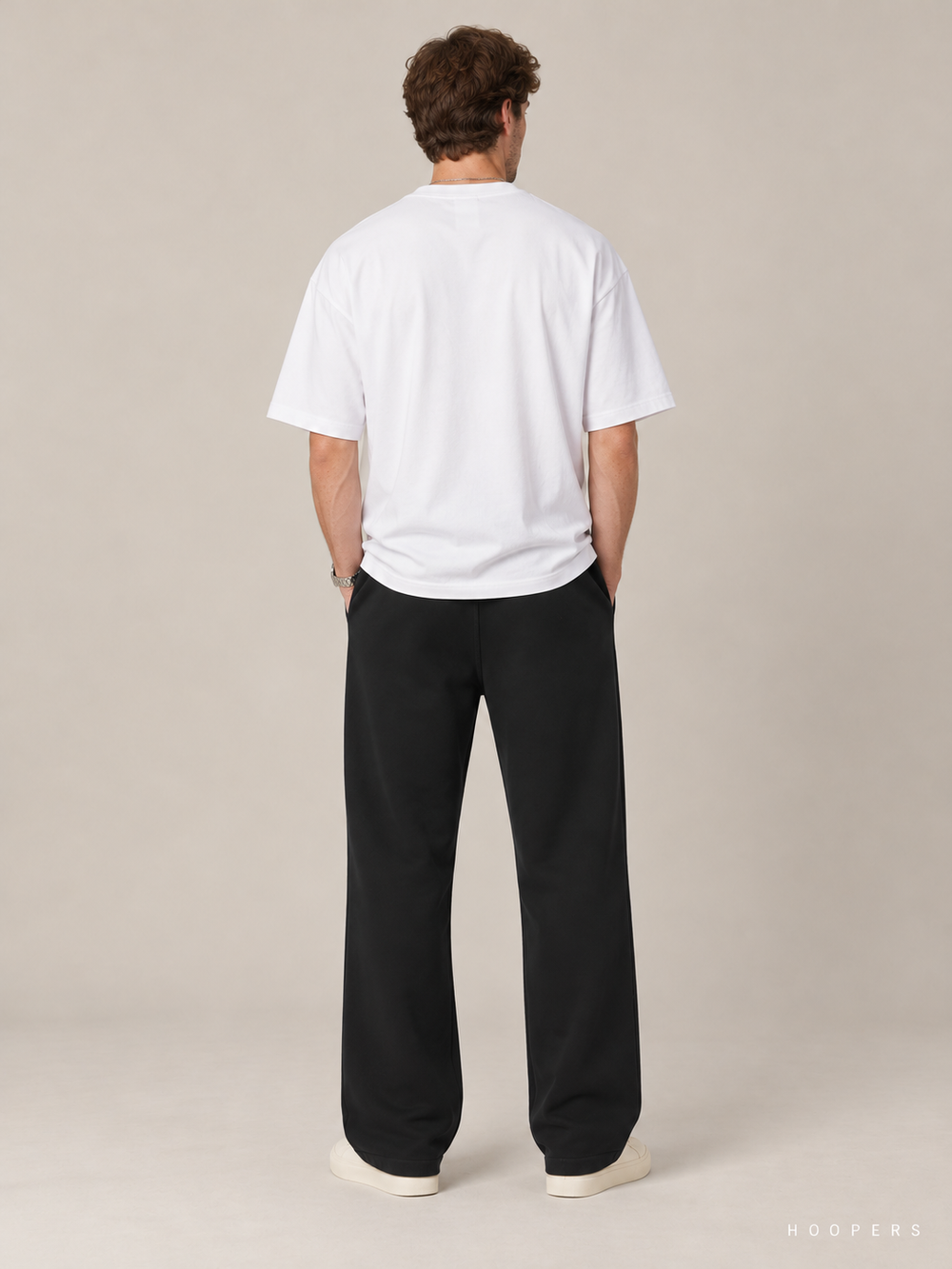 מכנס טרנינג Fear of God Essentials – Gold Script שחור – גב