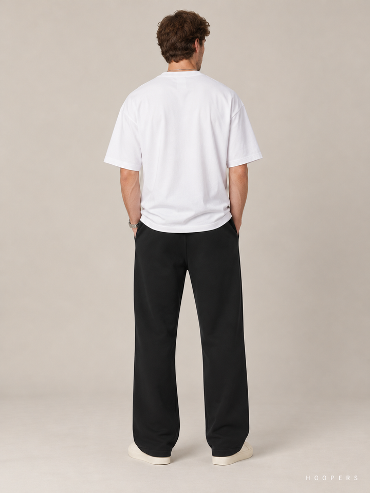 מכנס טרנינג Fear of God Essentials – Gold Script שחור – גב