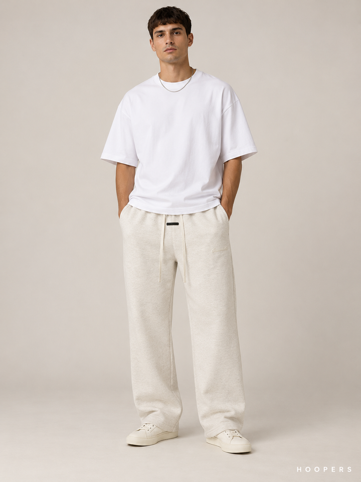 מכנס טרנינג Fear of God Essentials – Relaxed שמנת מלאנז' – חזית