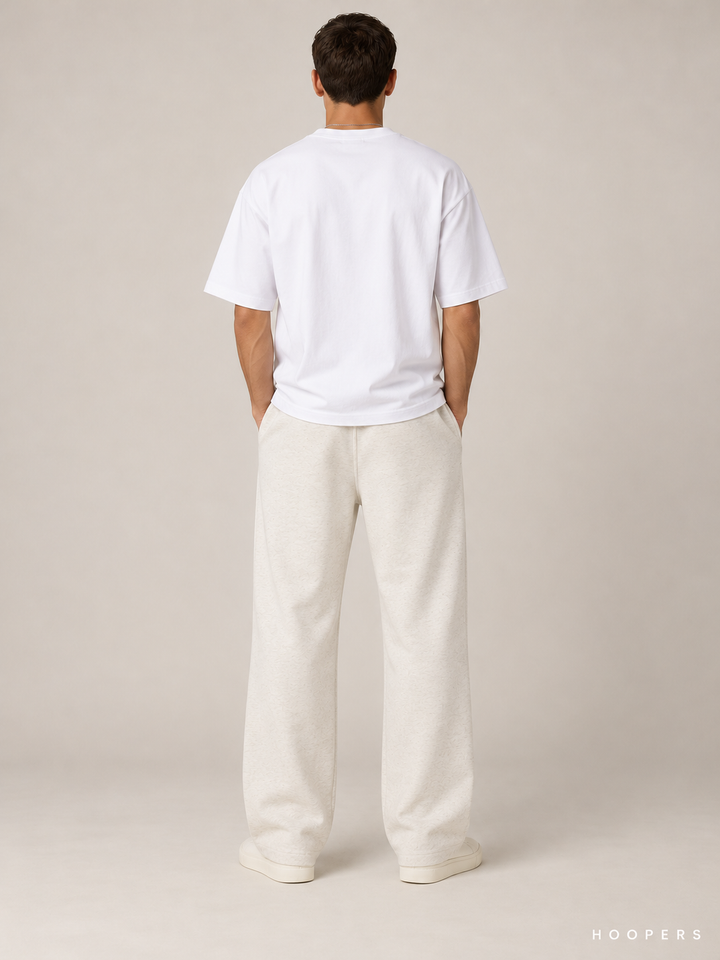 מכנס טרנינג Fear of God Essentials – Relaxed שמנת מלאנז' – גב