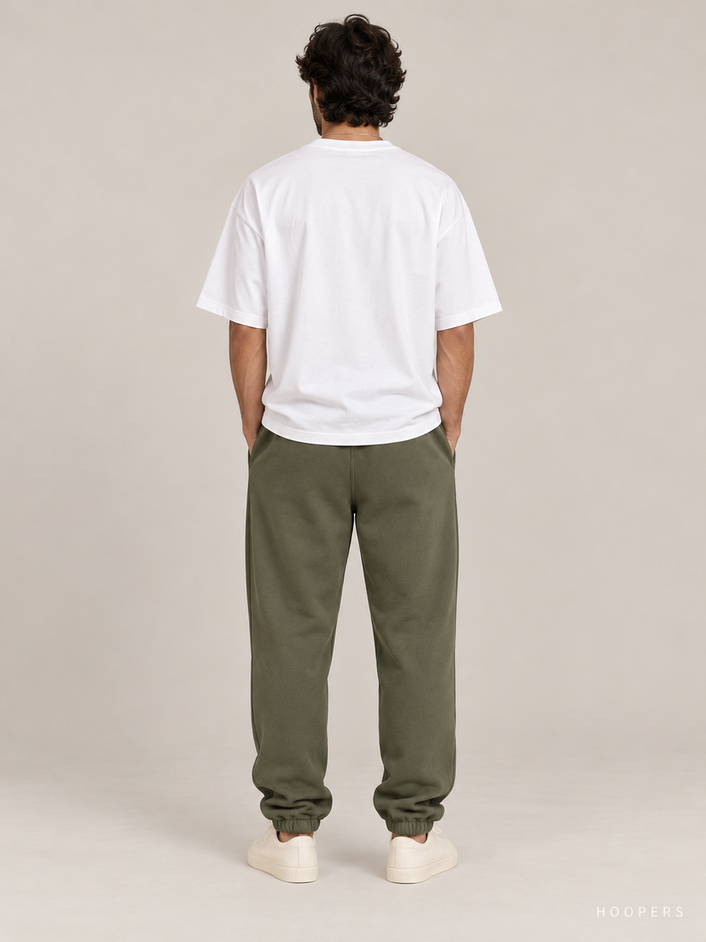 מכנס טרנינג Fear of God Essentials – Arch Jogger ירוק זית – גב