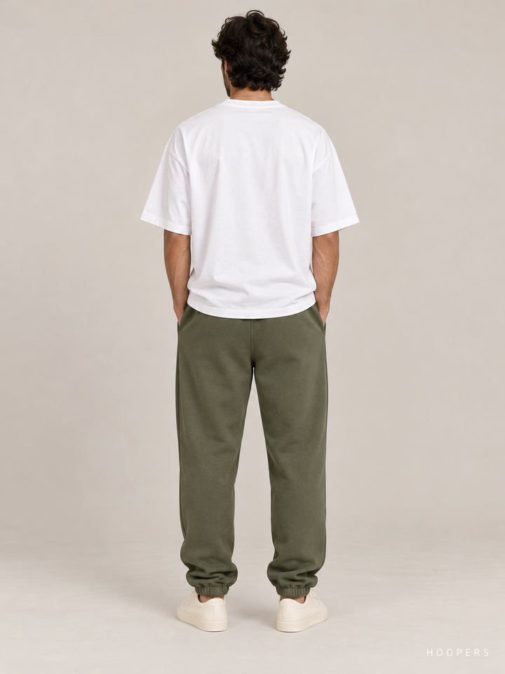 מכנס טרנינג Fear of God Essentials – Arch Jogger ירוק זית – גב