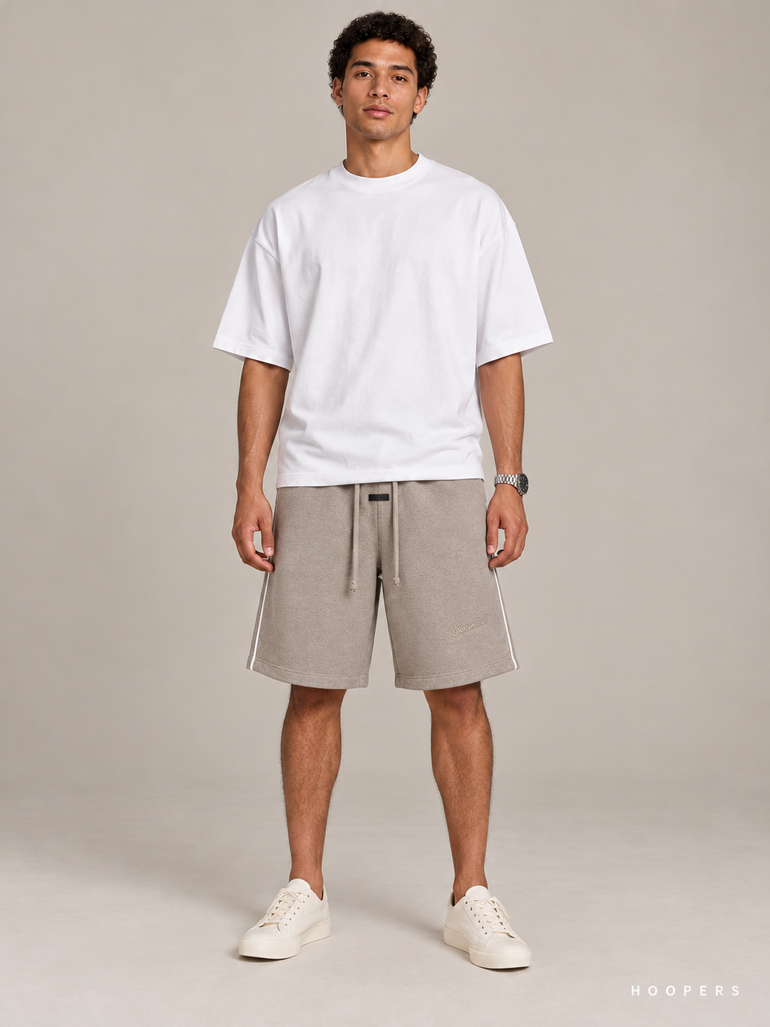 מכנס קצר Fear of God Essentials – Piping טאופ מלאנז' – חזית