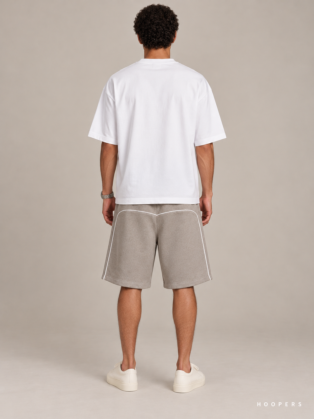 מכנס קצר Fear of God Essentials – Piping טאופ מלאנז' – גב