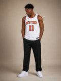 גופיית NBA ג'יילן ברונסון ניו יורק ניקס – לבן | HOOPERS