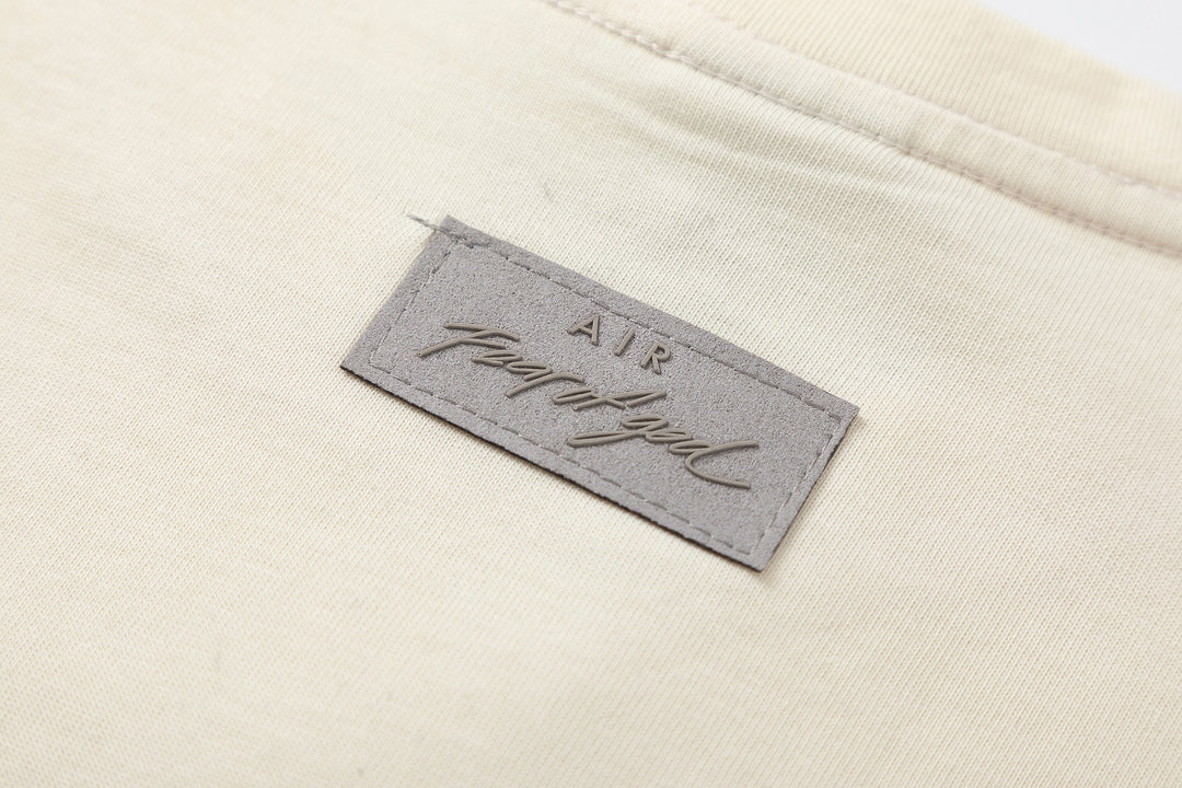 חולצה שמנת FOG