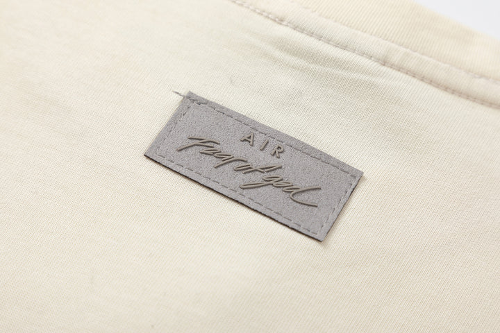 חולצה שמנת FOG