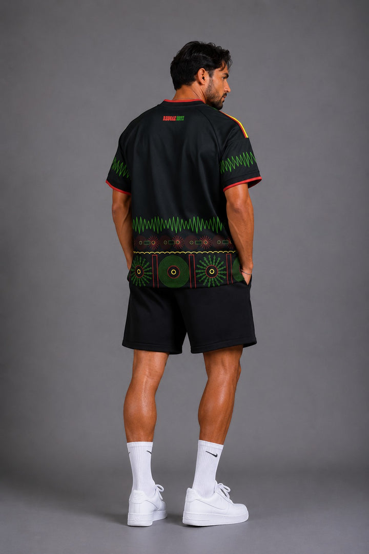Hoopers black t-shirt with reggae-inspired green, red, and yellow graphic print. Short sleeves, crew neck.