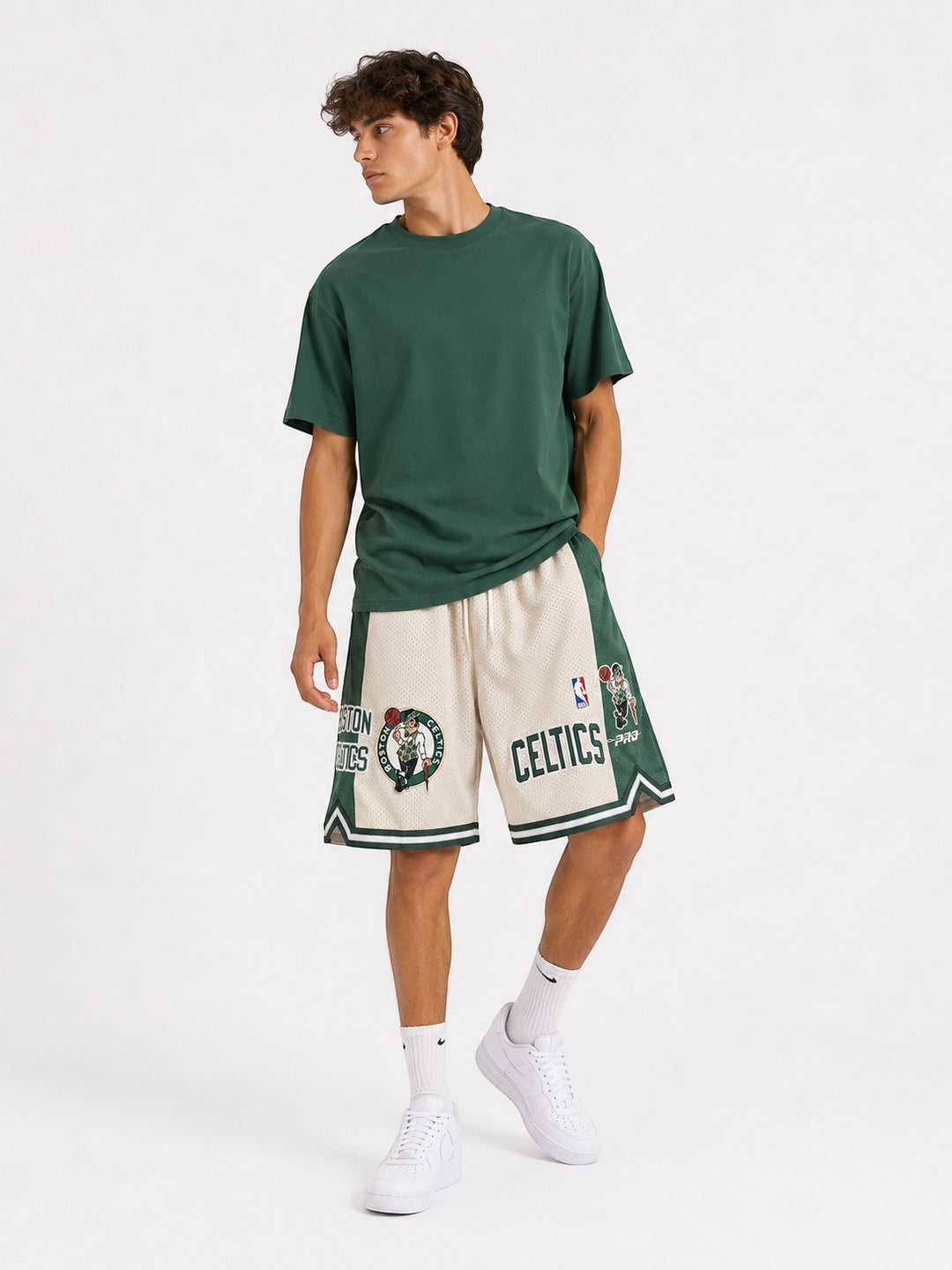 Hoopers Boston Celtics retro shorts in cream and green, featuring iconic team logos and a relaxed fit.