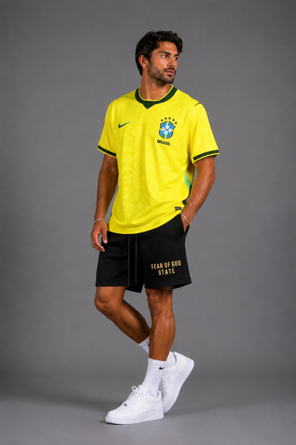 Hoopers yellow and green Brazil World Cup football jersey with subtle patterns. Model wears oversized fit.
