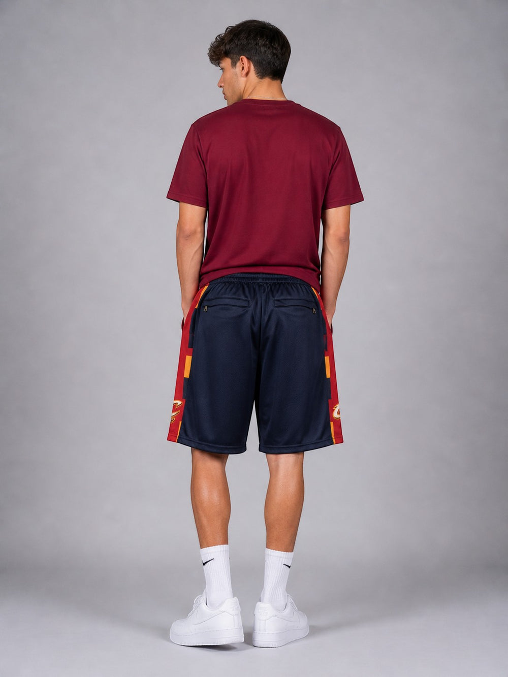 Hoopers men's navy NBA shorts with red and gold side panels, featuring Cleveland Cavaliers logo detail.