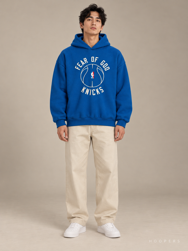 קפוצ'ון Fear of God Essentials x NBA – ניו יורק ניקס כחול | HOOPERS