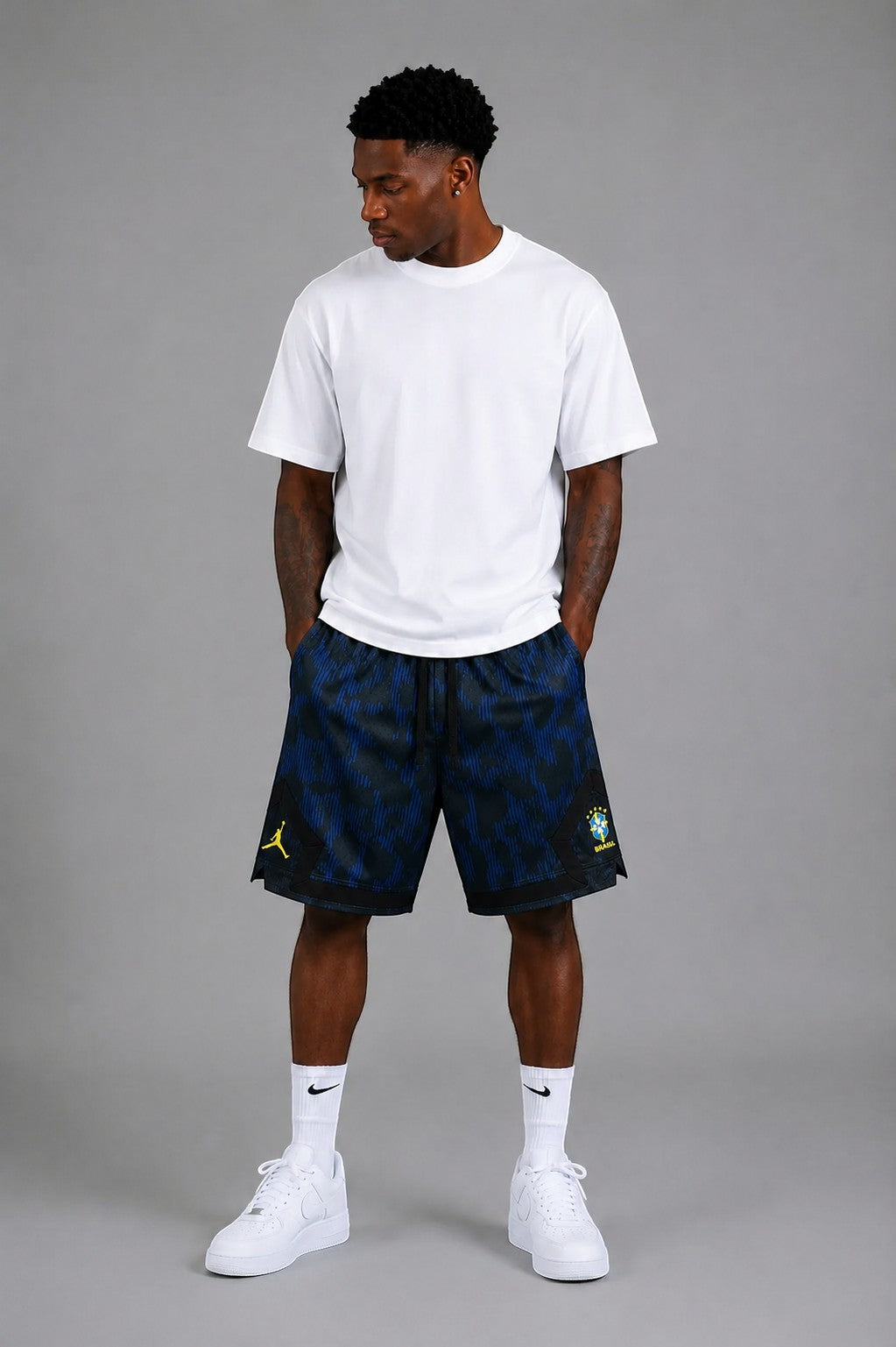 Hoopers Jordan blue and black Phantom shorts with a unique texture and yellow accents. Men's basketball shorts.