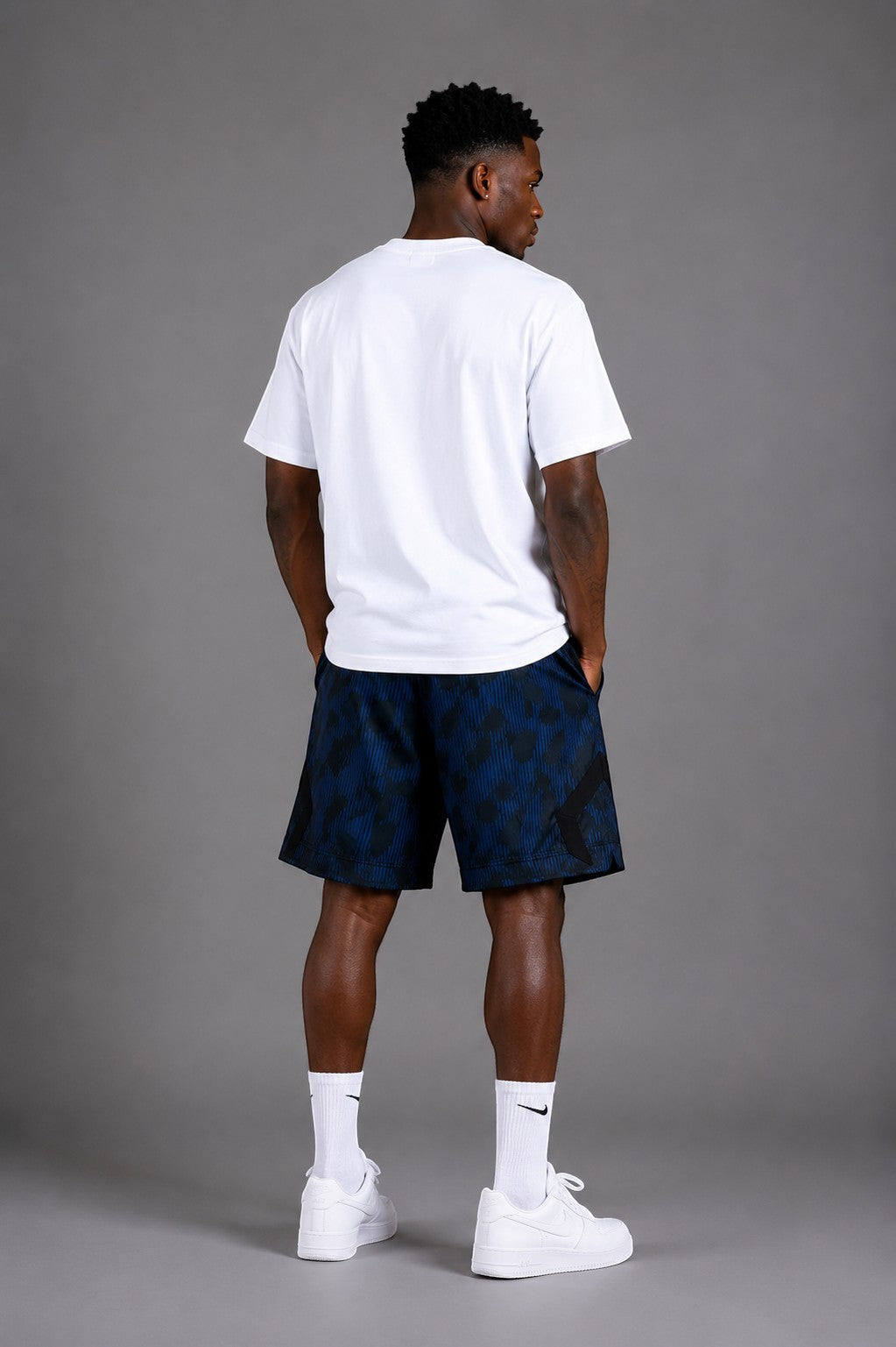 Hoopers Jordan Blue Phantom shorts in black and blue with a unique texture and bold logos. Men's athletic shorts.