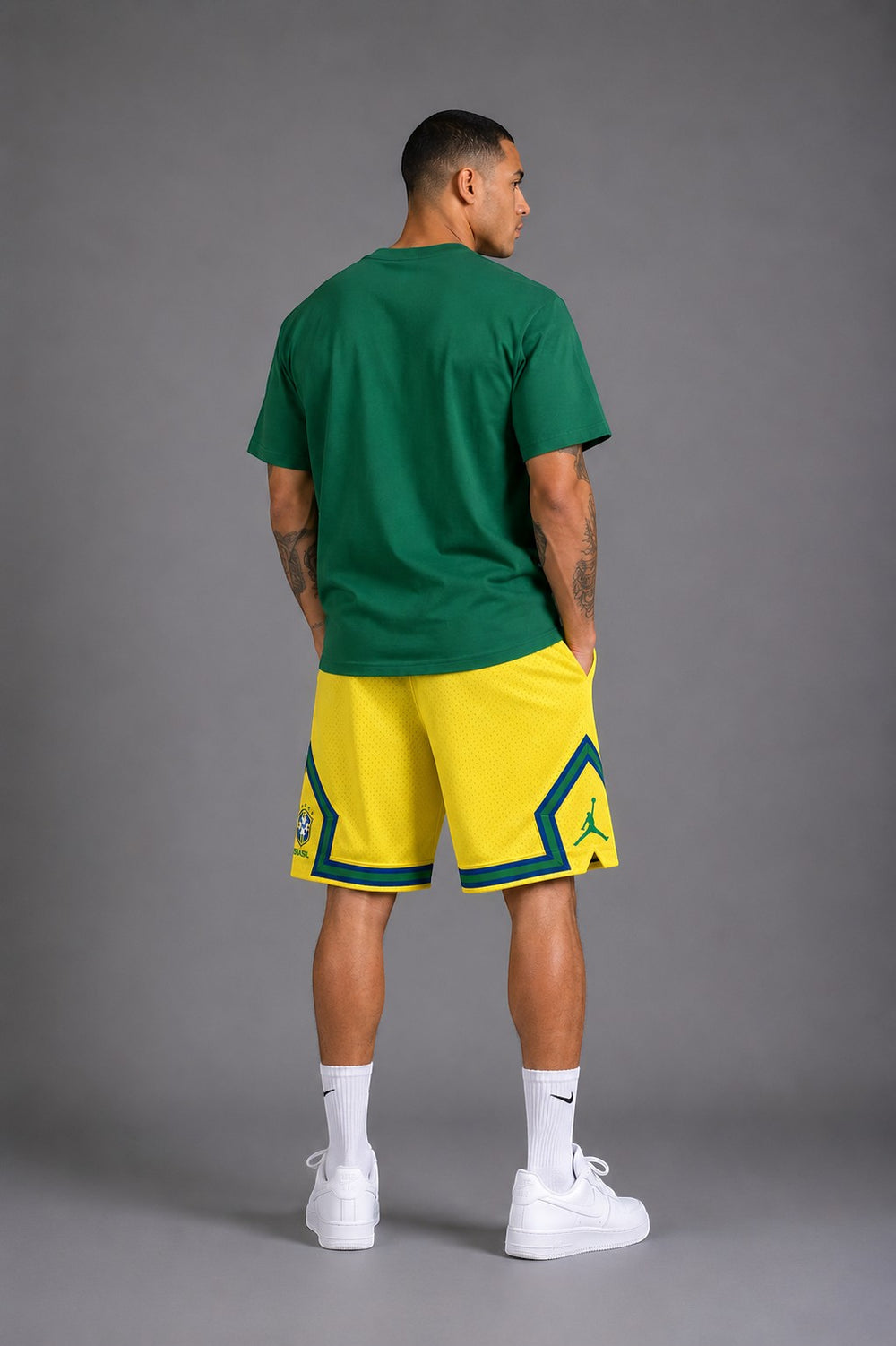 Hoopers Jordan Brasil Edition yellow mesh shorts with green and blue trim, featuring Jordan logo and Brazil flag detail.