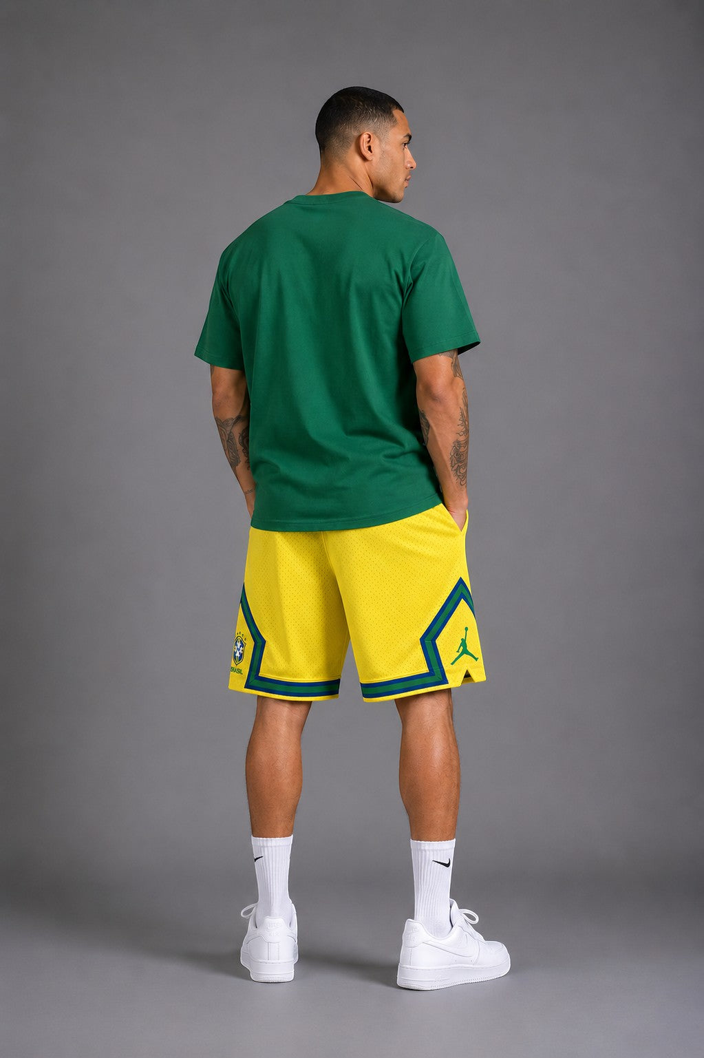Hoopers Jordan Brasil Edition yellow mesh shorts with green and blue trim, featuring Jordan logo and Brazil flag detail.