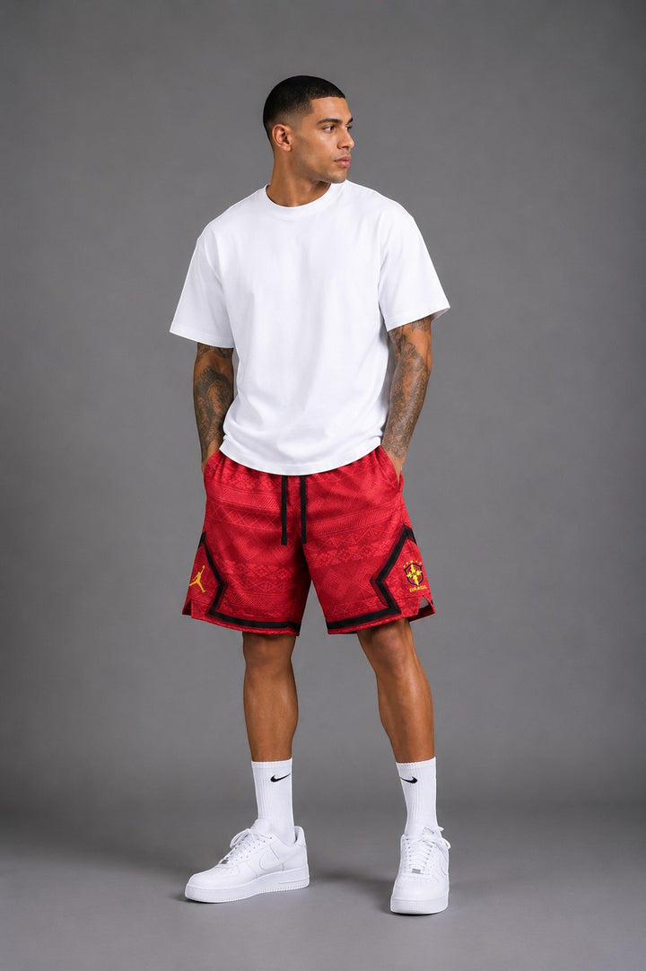 Hoopers Jordan Brasil Sunset Edition red mesh shorts with black and yellow accents. Model wears size L.