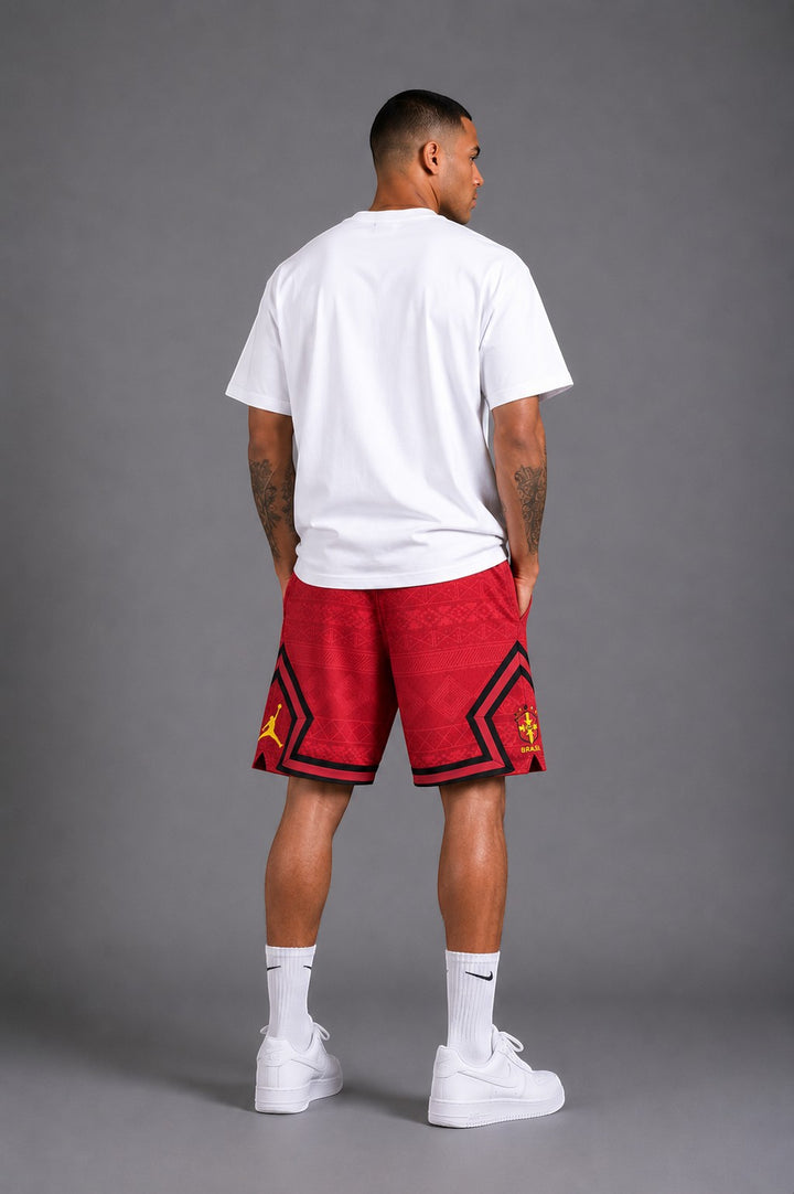 Hoopers Jordan Brasil Sunset Edition red, black, and yellow mesh basketball shorts with geometric pattern and Jordan logo.