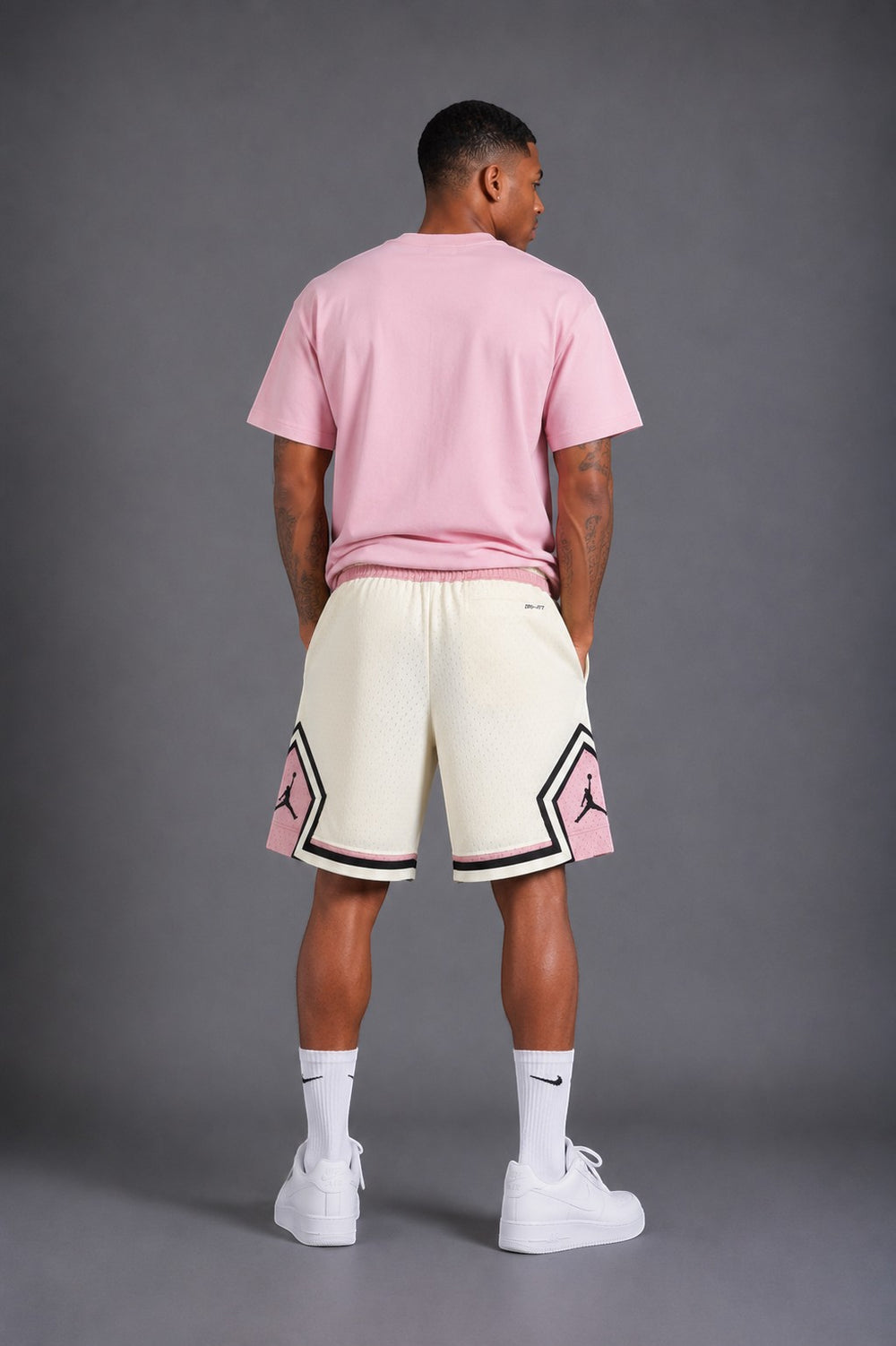 Hoopers Jordan Cream Rose Edition mesh shorts with pink and black accents, elastic waistband, and Jordan logo.