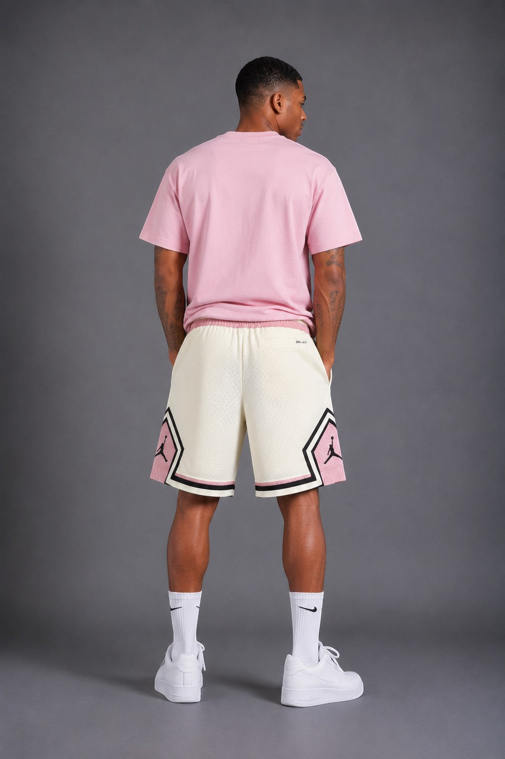 Hoopers Jordan Cream Rose Edition mesh shorts with pink and black accents, elastic waistband, and Jordan logo.