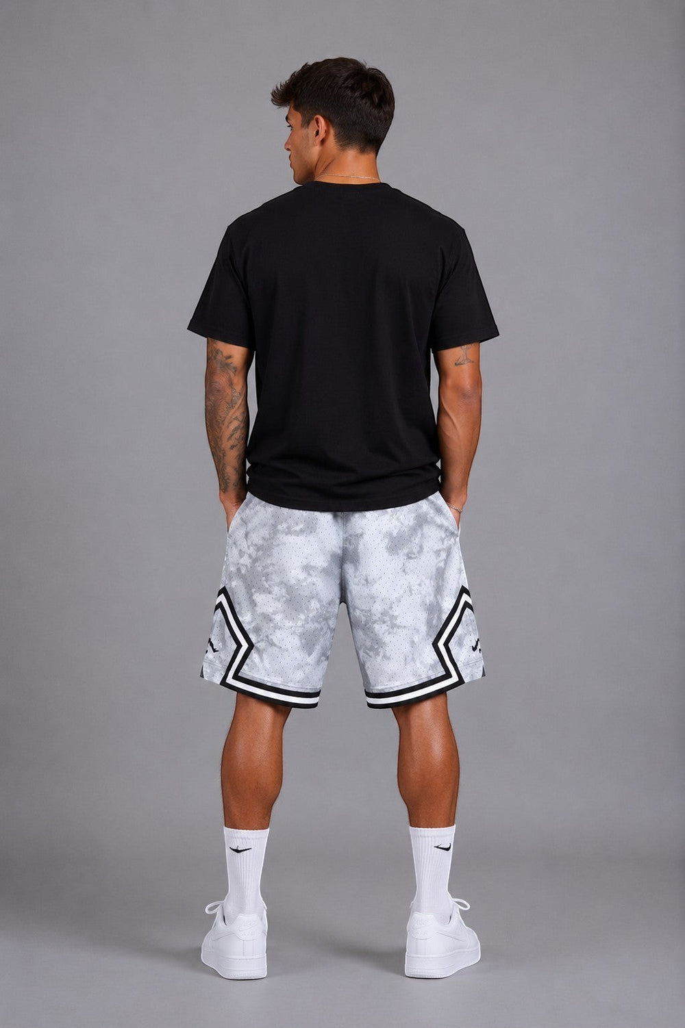 Hoopers men's Jordan Ice Smoke basketball shorts in grey with a tie-dye pattern and white trim.