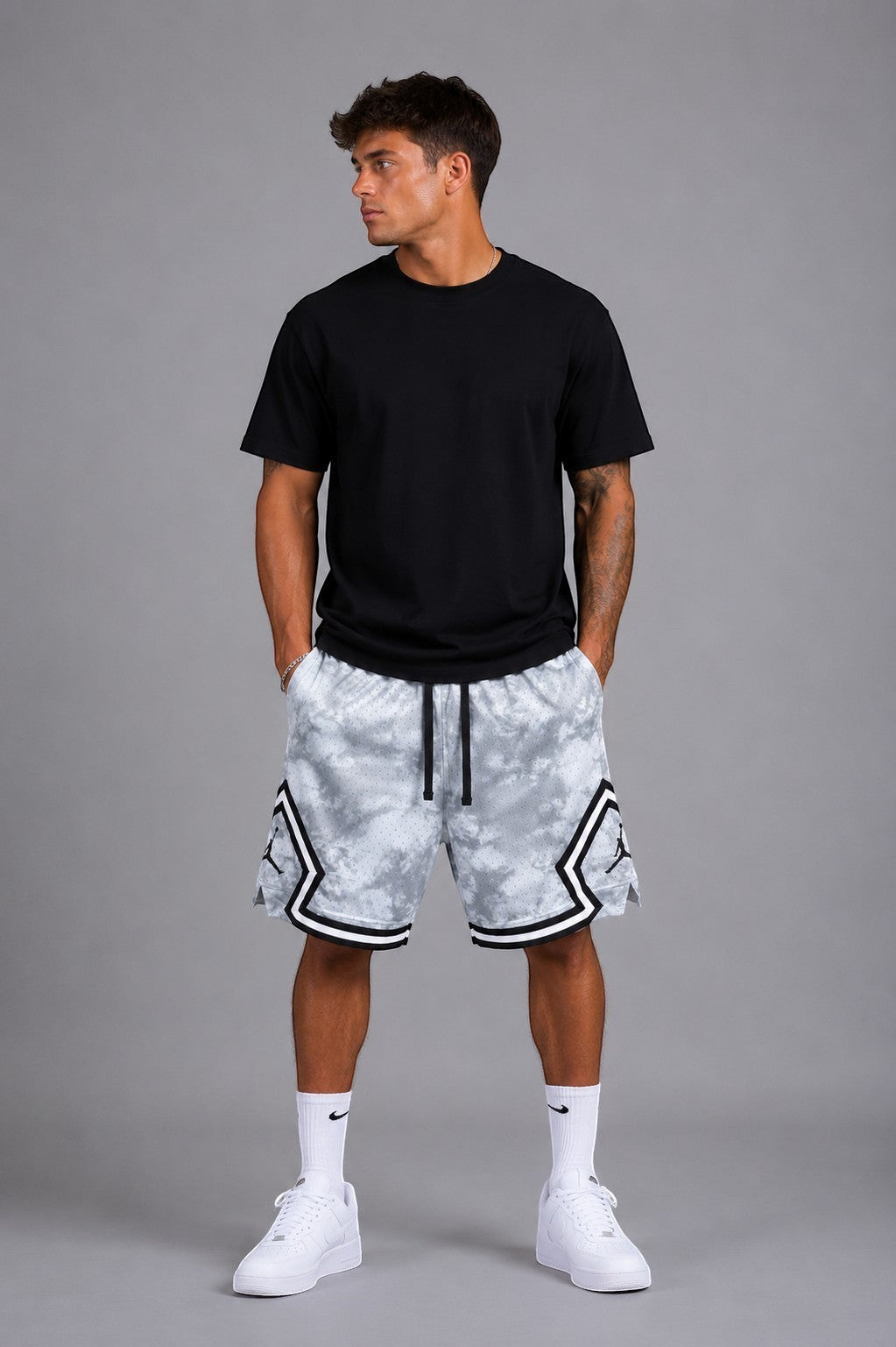 Hoopers men's Jordan Ice Smoke basketball shorts in grey with white tie-dye pattern and black trim.