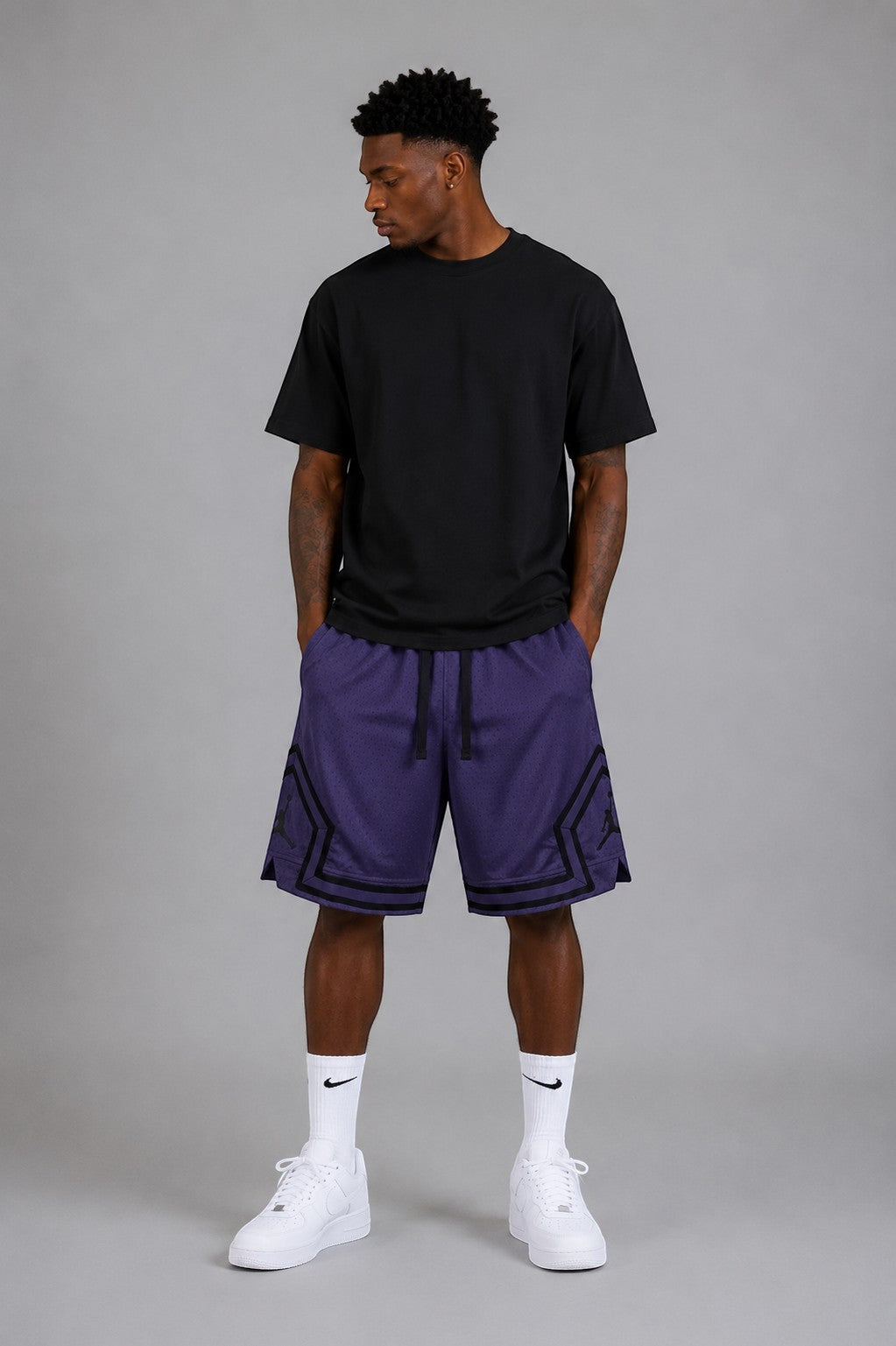 Hoopers Jordan Shadow Purple mesh basketball shorts with black trim and Jordan logo detail. Men's oversized fit.