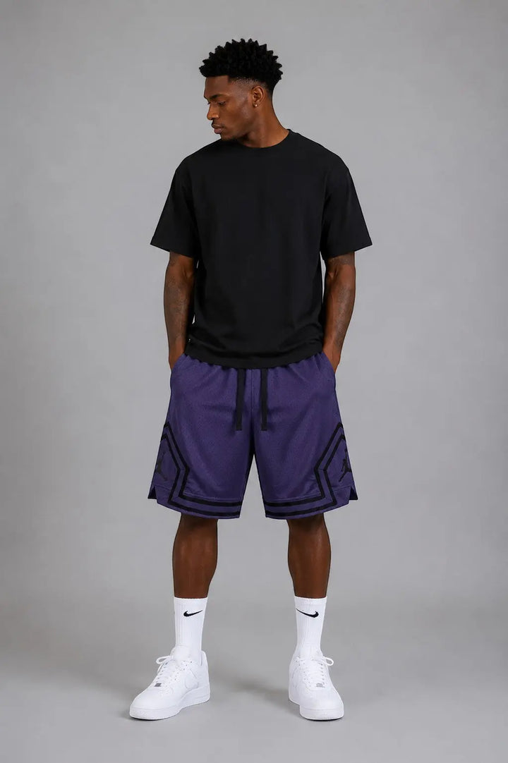 Hoopers Jordan Shadow Purple mesh basketball shorts with black trim and Jordan logo detail. Men's oversized fit.