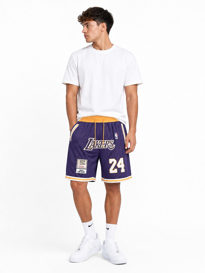 Hoopers purple Los Angeles Lakers Kobe Bryant 2000-01 NBA shorts with gold trim and number 24.