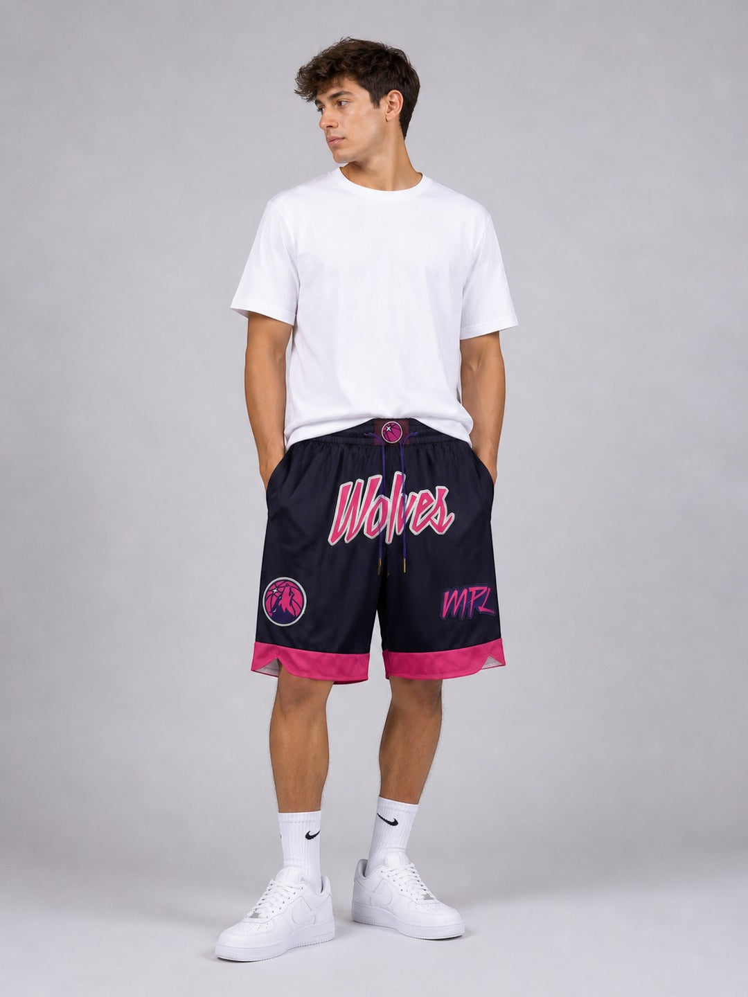 Hoopers men's navy NBA shorts with pink trim, featuring 'Wolves' and 'MPL' graphics. Made of lightweight, breathable mesh.