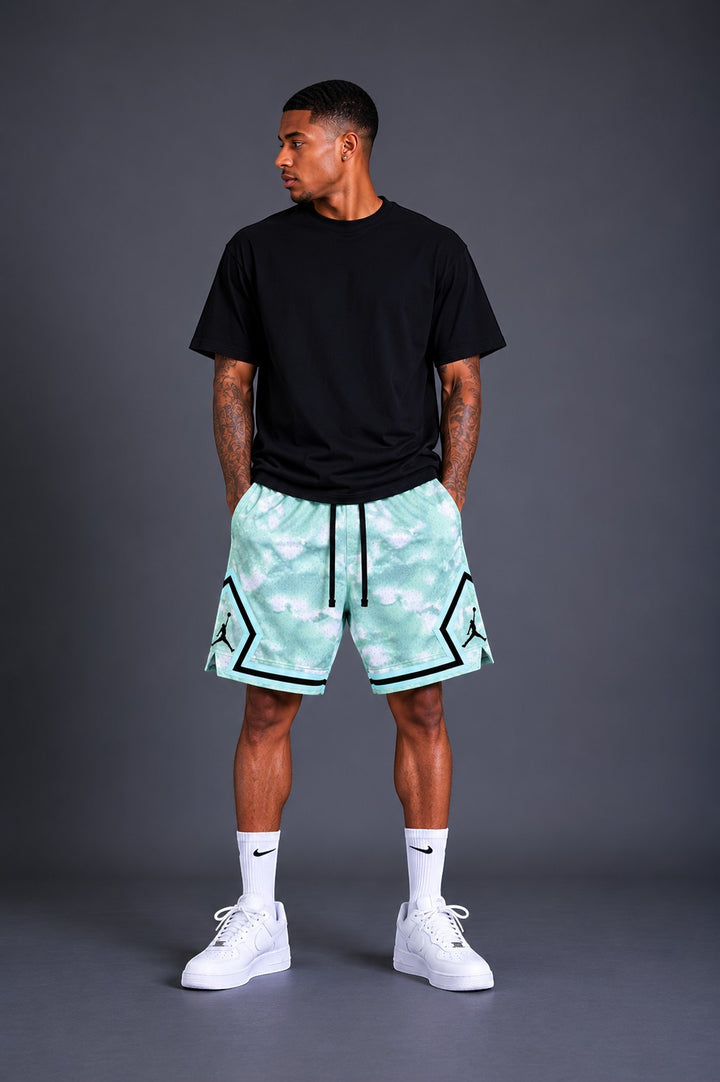 Hoopers men's mint green and white tie-dye mesh basketball shorts with black trim and Jordan logos.