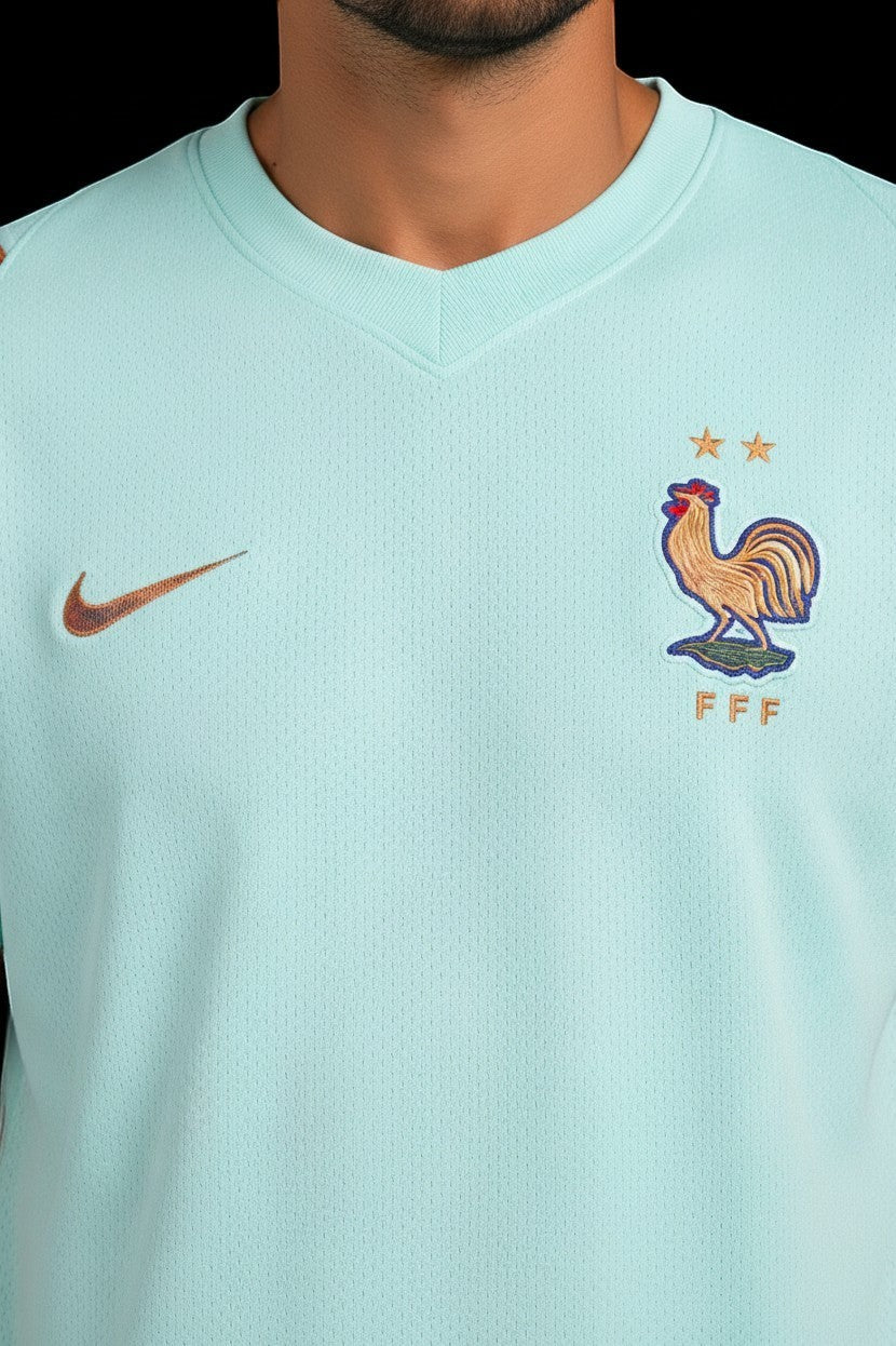 Hoopers light mint green France football jersey with embroidered rooster and FFF logo. Nike swoosh on chest.