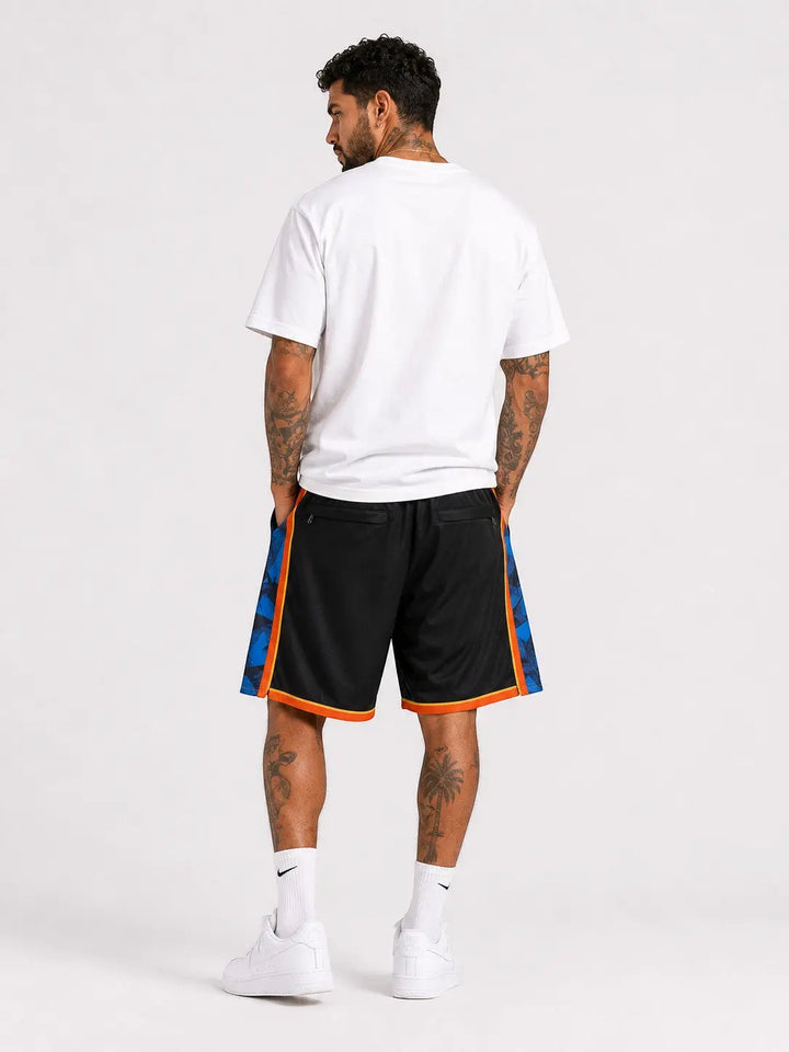 Hoopers black basketball shorts with blue and orange trim, featuring Oklahoma City Thunder graphic details.