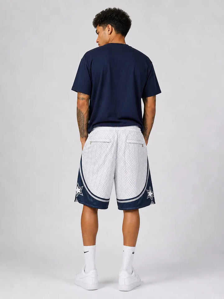 Hoopers white and navy blue retro Orlando Magic basketball shorts with star accents, made of polyester mesh.