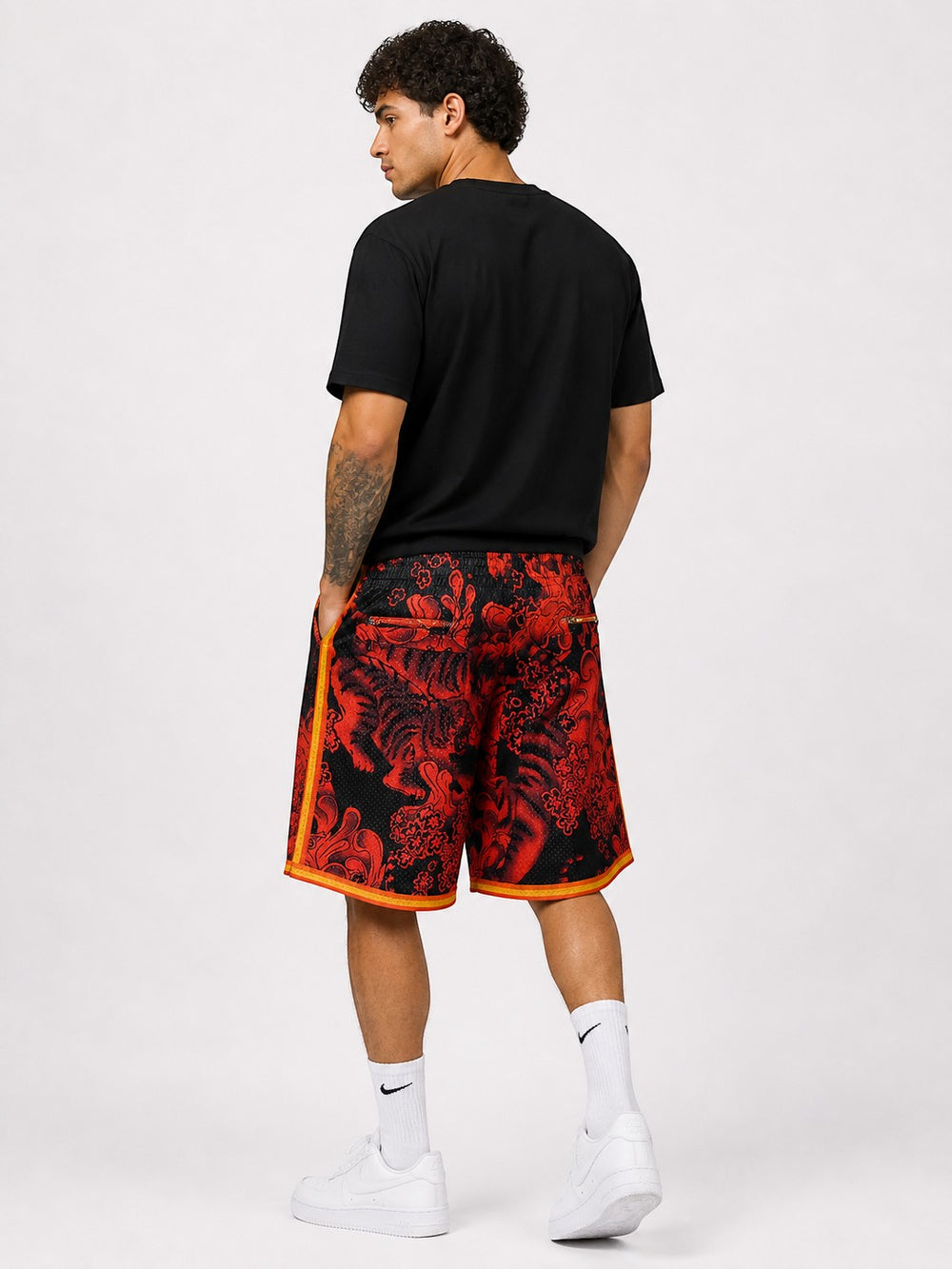 Hoopers men's red and black mesh basketball shorts with dragon graphic print and yellow trim