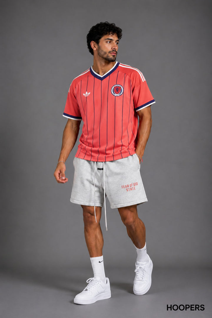 Hoopers Retro Red Edition Scotland soccer jersey with navy trim and vertical stripes, V-neck, and Adidas logo.
