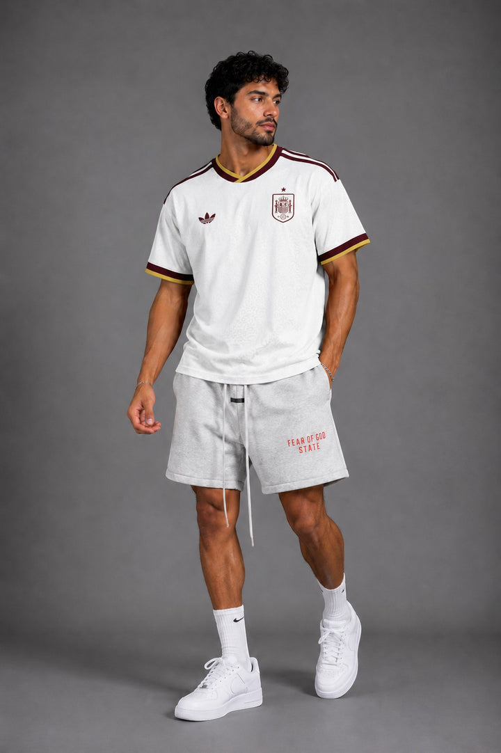 Hoopers white retro Spain World Cup football jersey with burgundy and gold trim. Features classic Adidas logo and Spain crest.