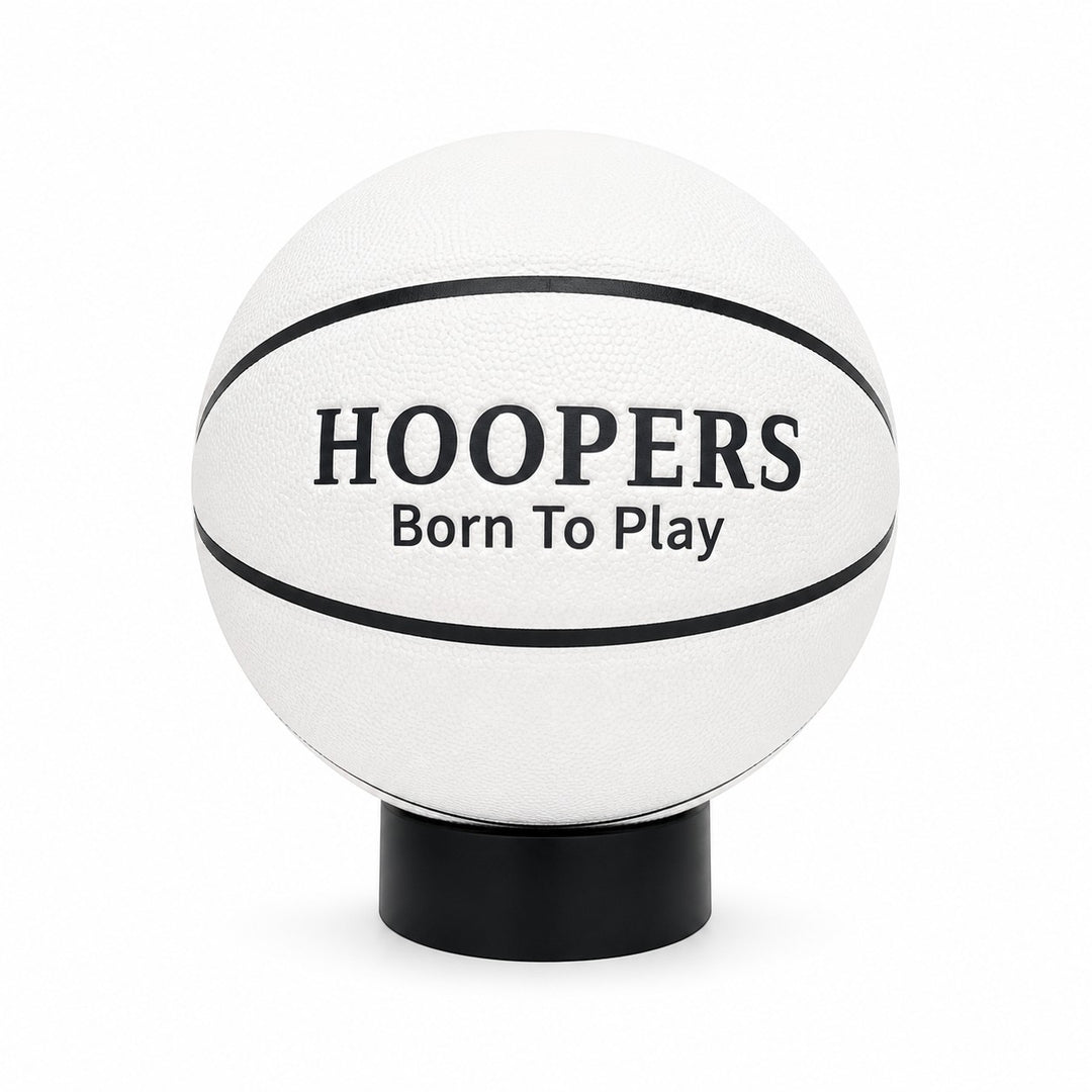 Hoopers white basketball with black lines, "HOOPERS Born To Play" text, and Israeli flag detail. Official size 7/5.