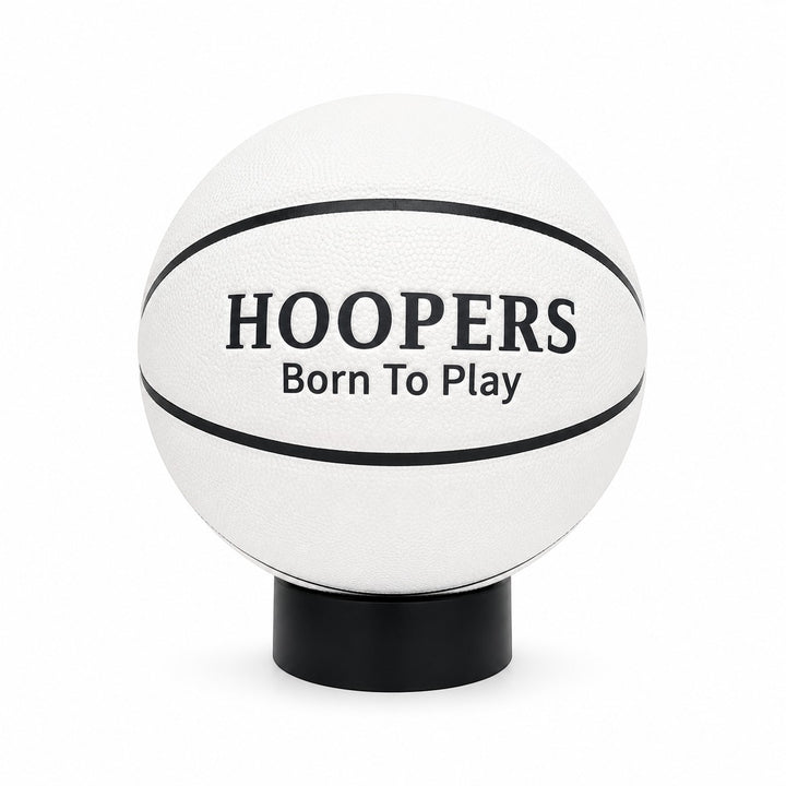 Hoopers white basketball with black lines, "HOOPERS Born To Play" text, and Israeli flag detail. Official size 7/5.