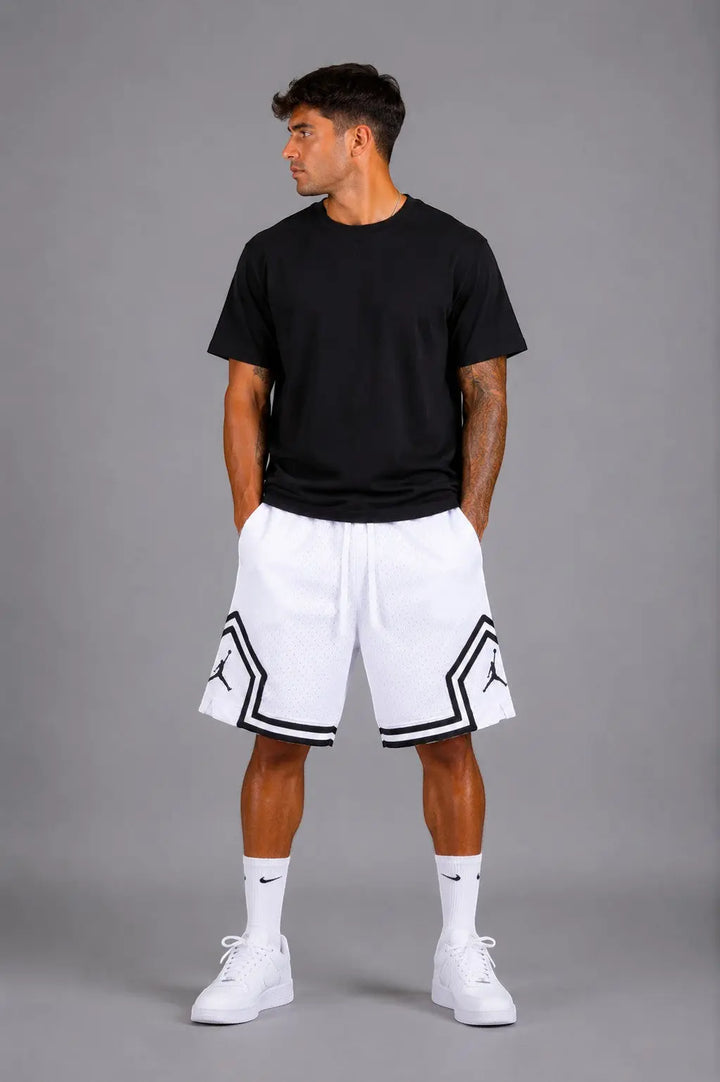 Hoopers men's white mesh basketball shorts with black trim and Jordan logo detail. Relaxed fit.