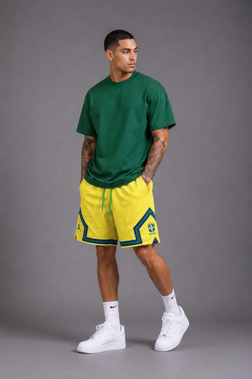 Hoopers men's yellow mesh shorts with green and blue trim, inspired by Brazil's football kit. Features Jordan logo.