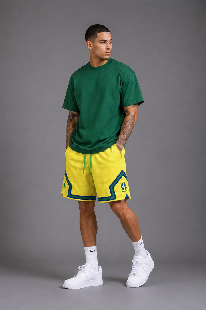 Hoopers men's yellow mesh shorts with green and blue trim, inspired by Brazil's football kit. Features Jordan logo.