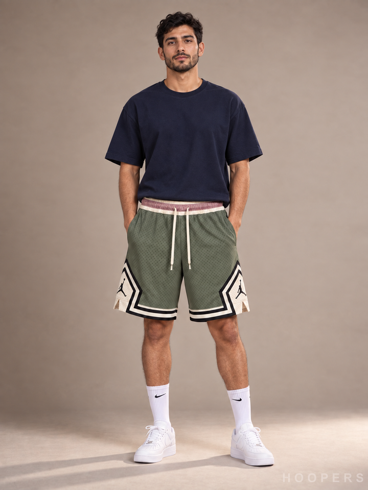 מכנסי Jordan Olive Cream — חזית עם דוגמן גבר