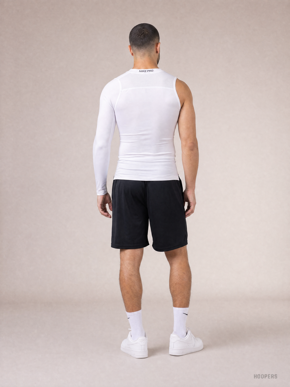 חולצה לבנה ארוכה צמודה יד אחת PRO – מבט אחורי | HOOPERS